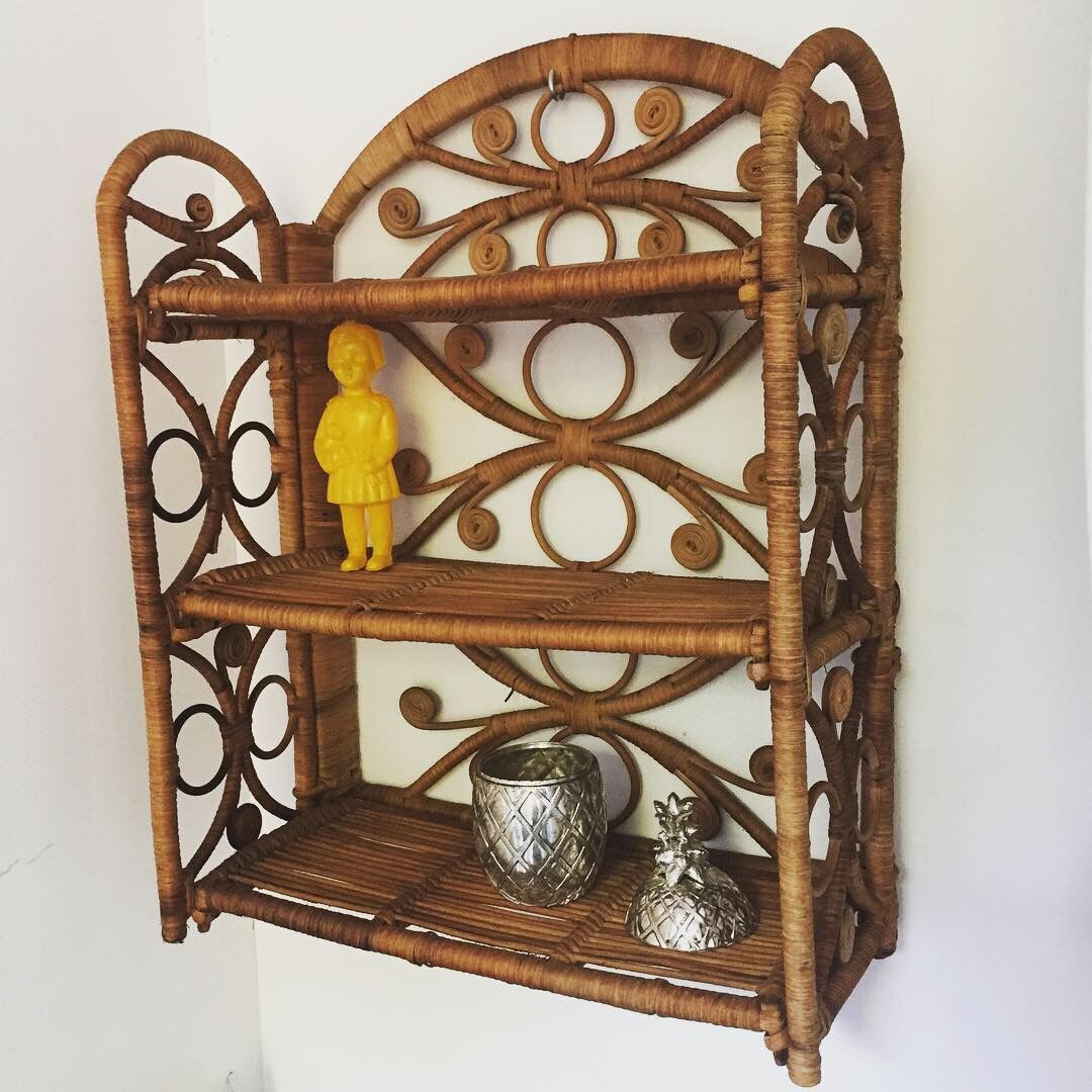 Vintage peacock rattan shelf