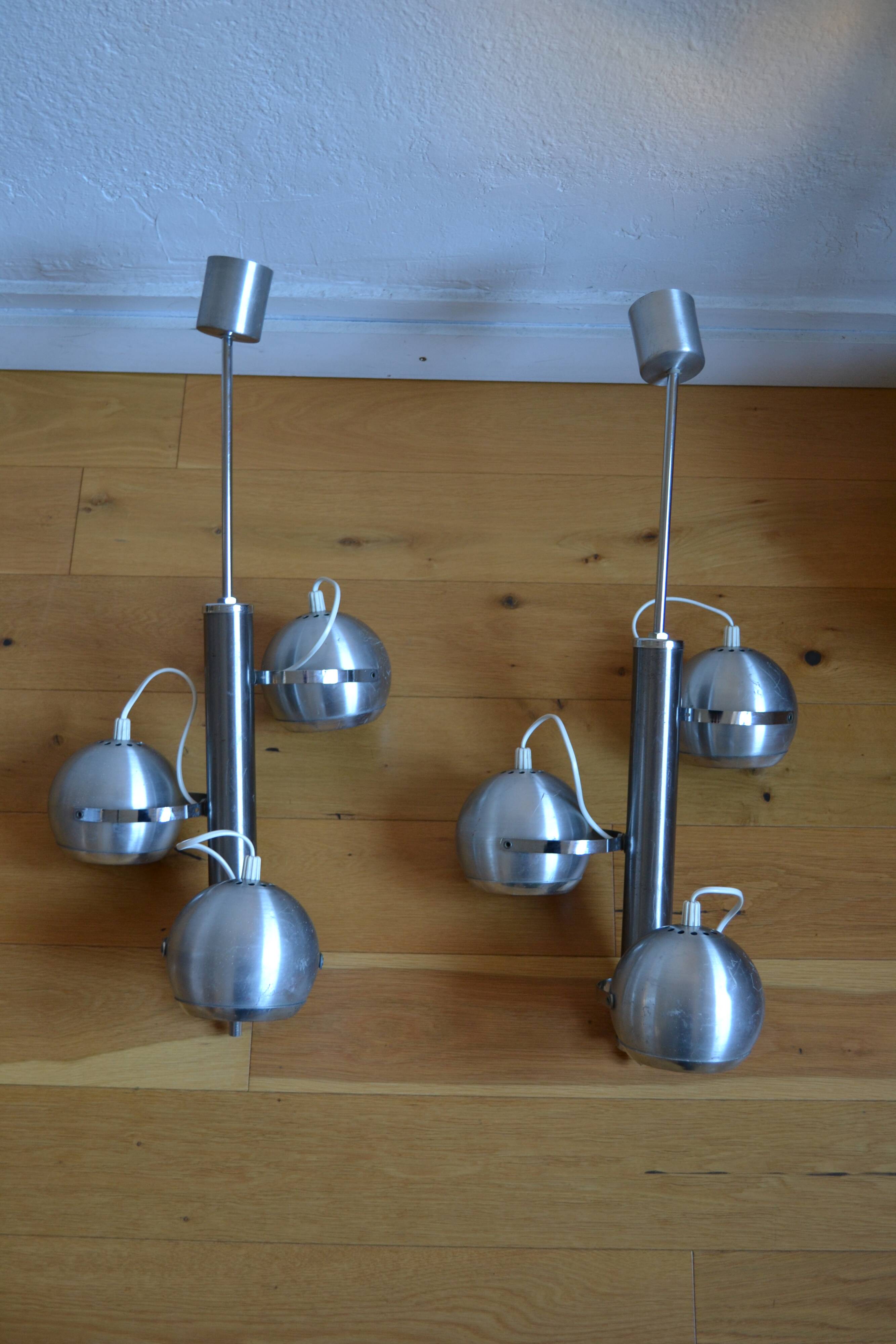 Pair of 70s space age eye ball chandeliers in brushed aluminum