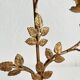 Antique bronze and brass candlestick with golden leaves