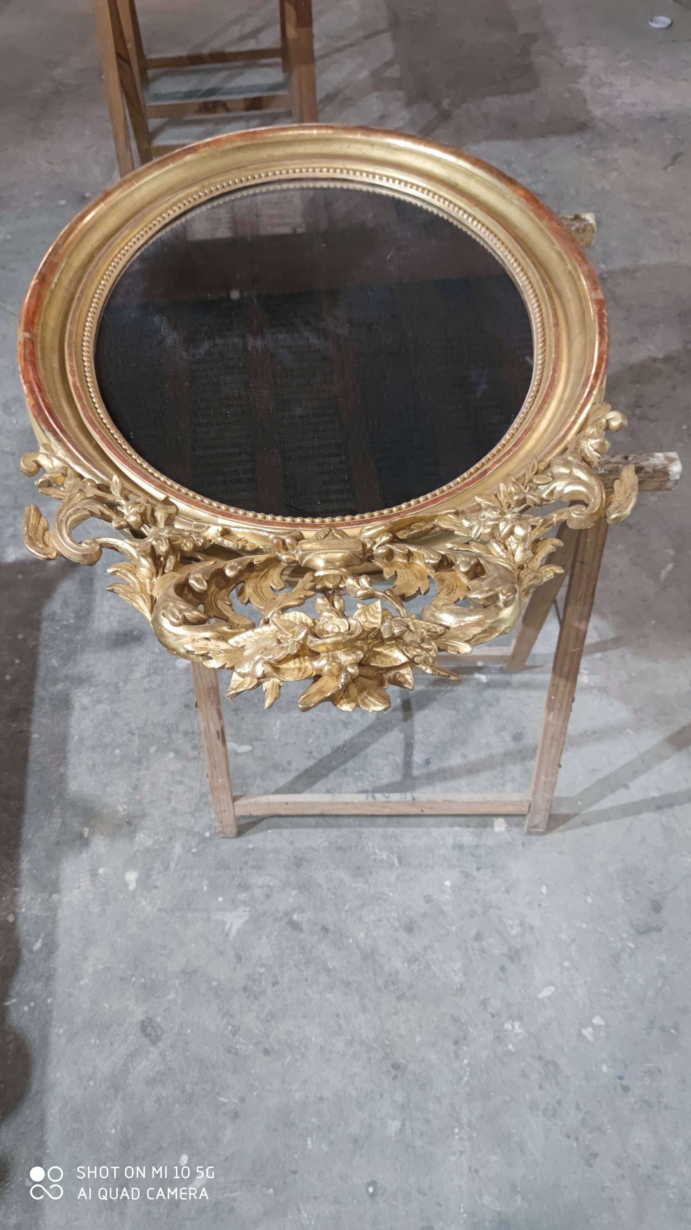 Mirror with a gilt medallion pediment, 1840