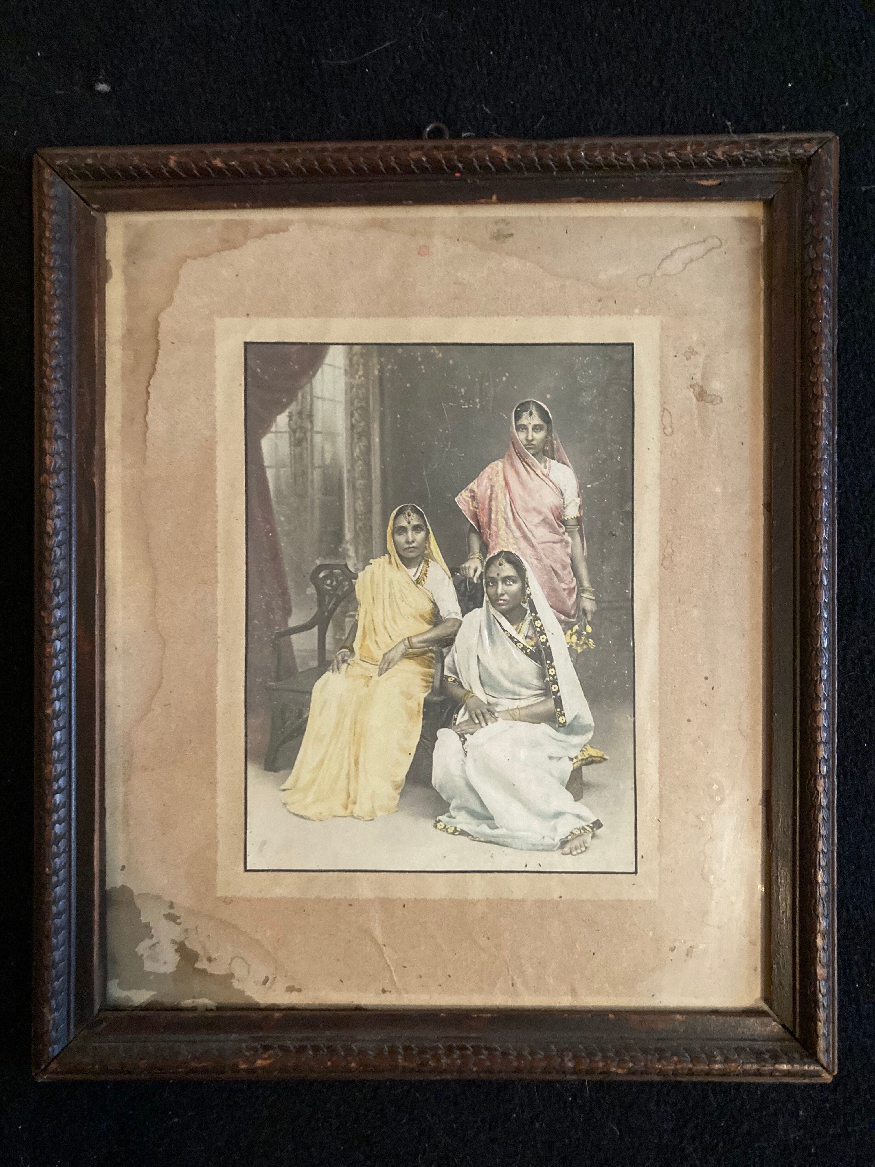 Indian vintage studio photo recolorized featuring 3 women in wooden frame