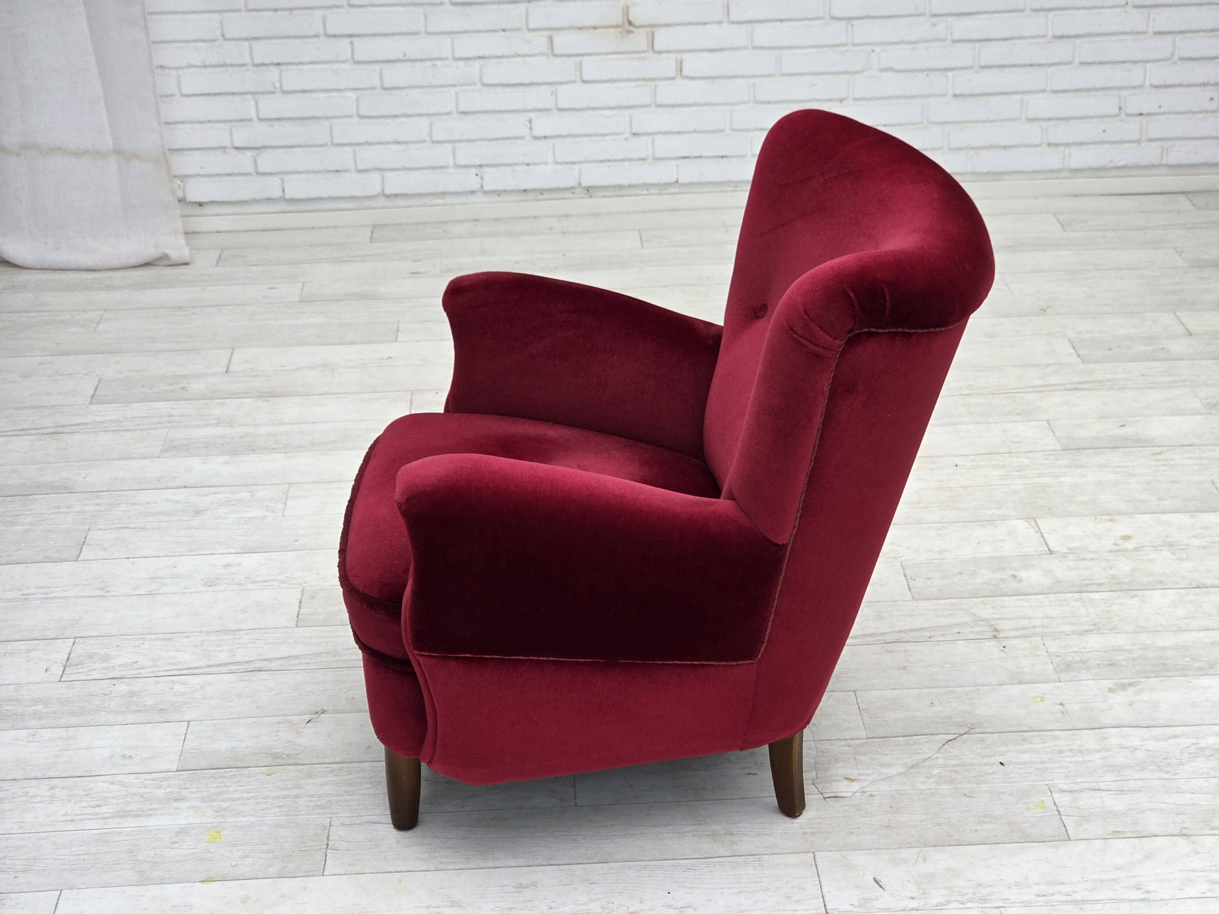 1960s, Danish armchair, cherry-red furniture velour, beech wood legs.