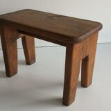 Small low stool in solid oak