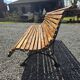 Wooden garden bench with cast iron base