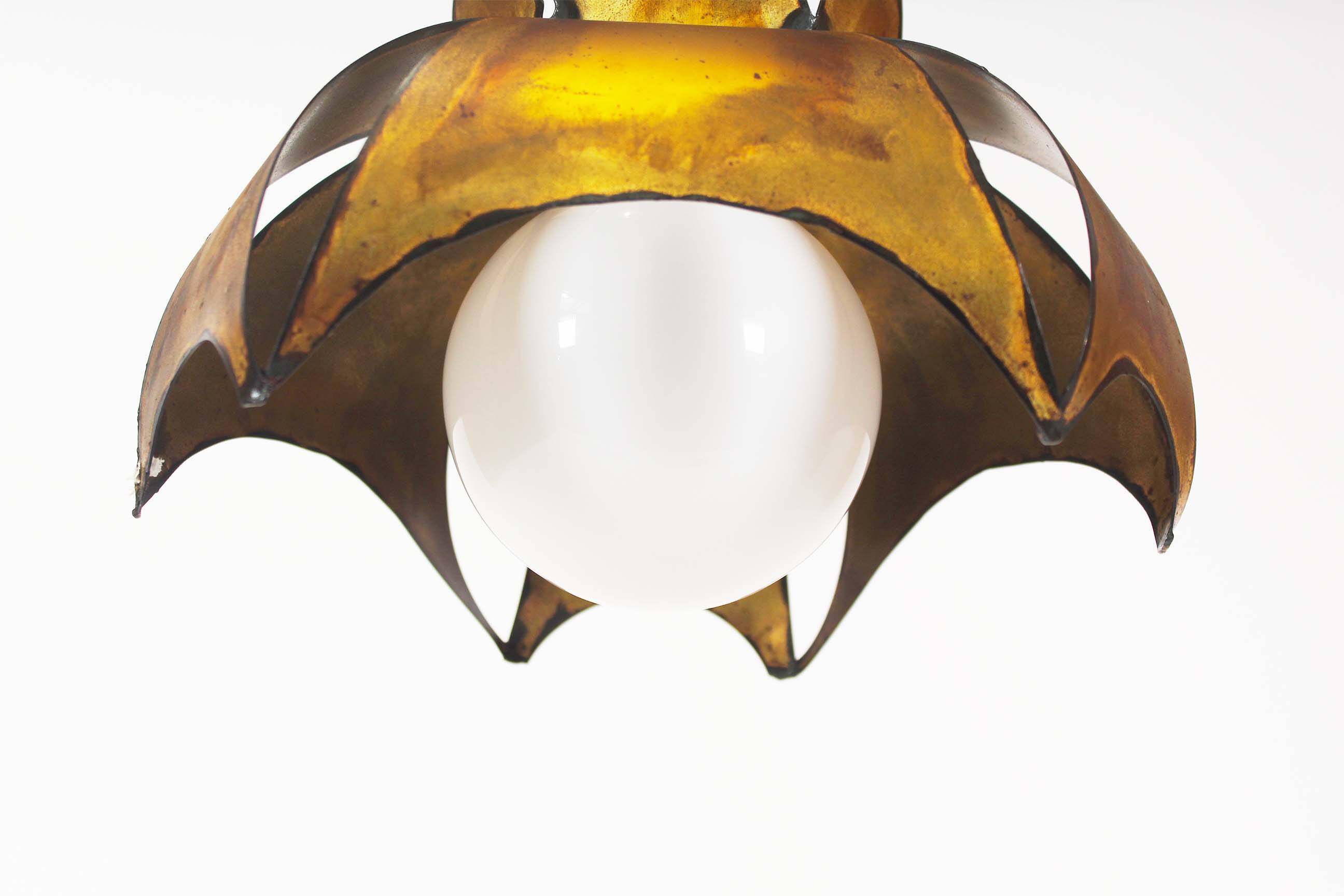 Original Italian torch cut brutalist brass chandelier