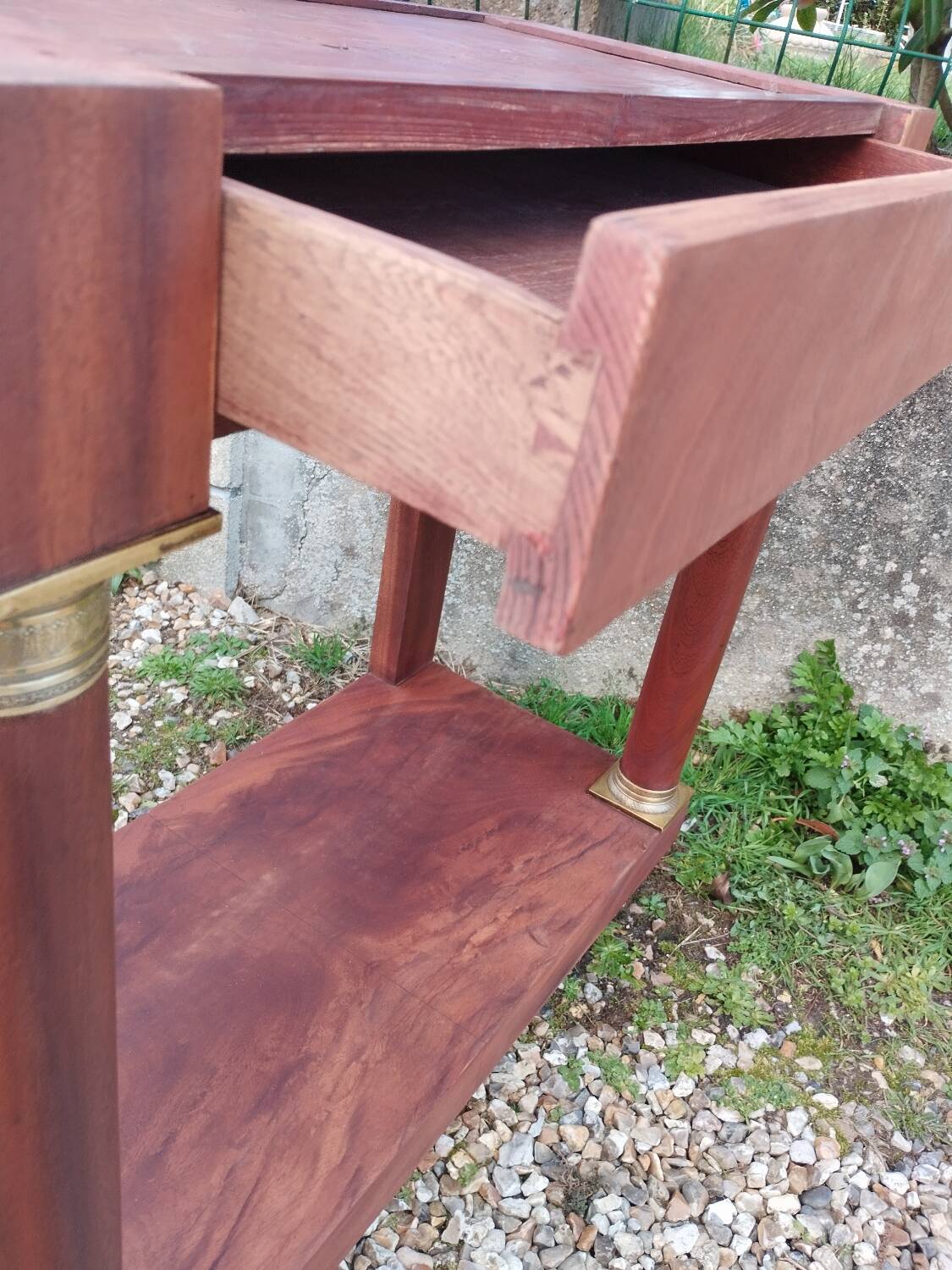 Console in old Empire style with a wooden frame and marble top.