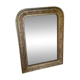 Golden mirror with mouldings