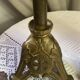 Pair of candlesticks in bronze and brass