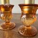 Set of 2 glass candle holders with candles