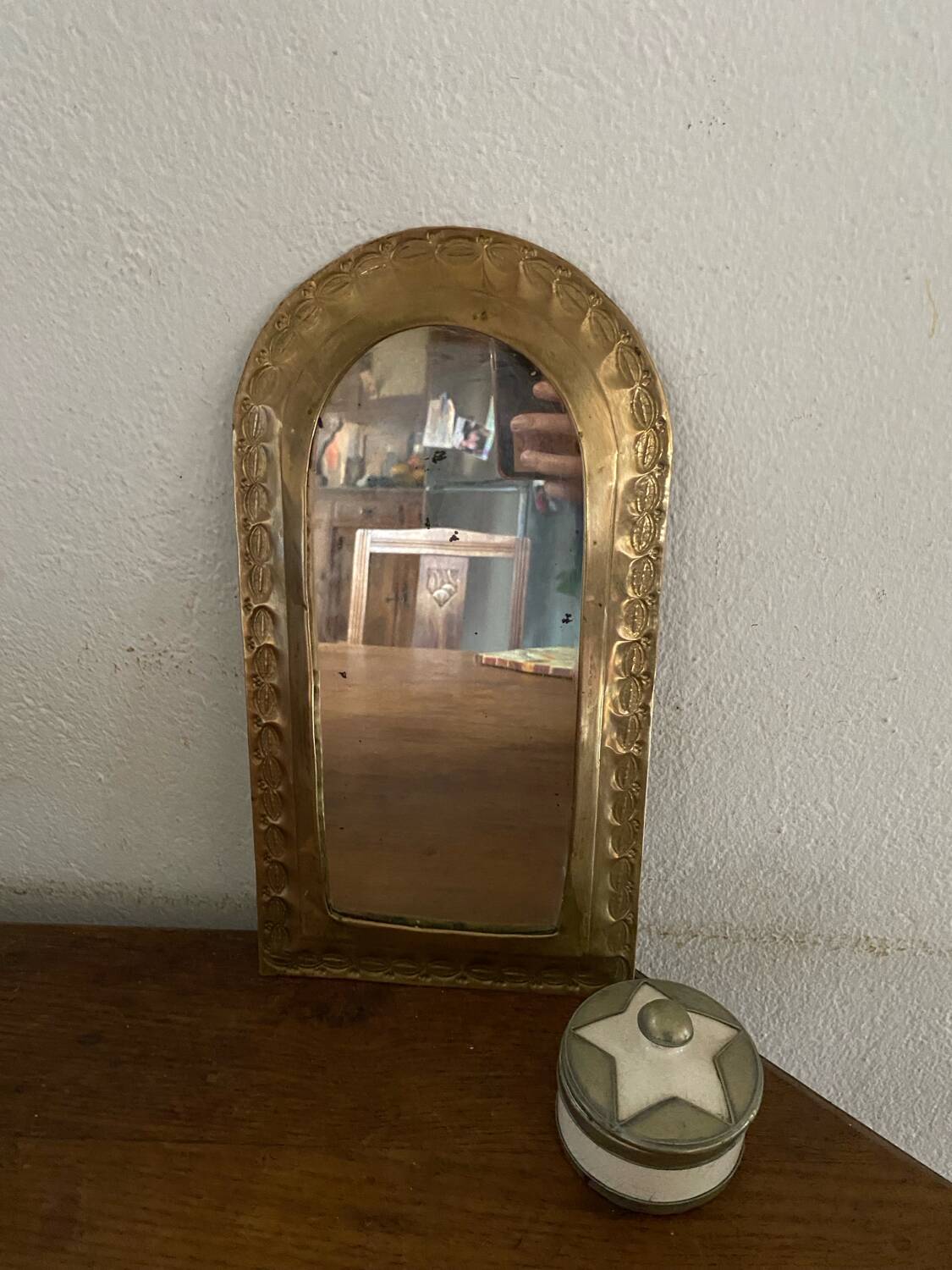Ethnic brass mirror crafted in the 1980s.
