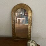 Ethnic brass mirror crafted in the 1980s.