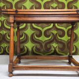 Console table in walnut, 20th century.