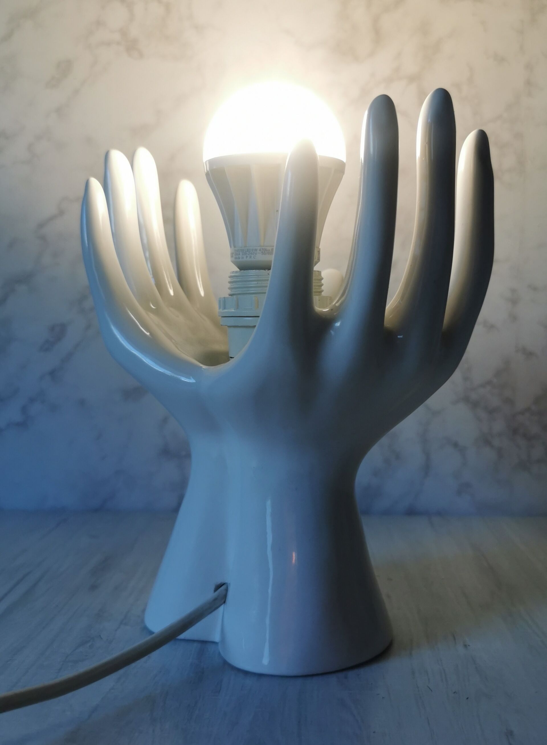 White ceramic hand lamp