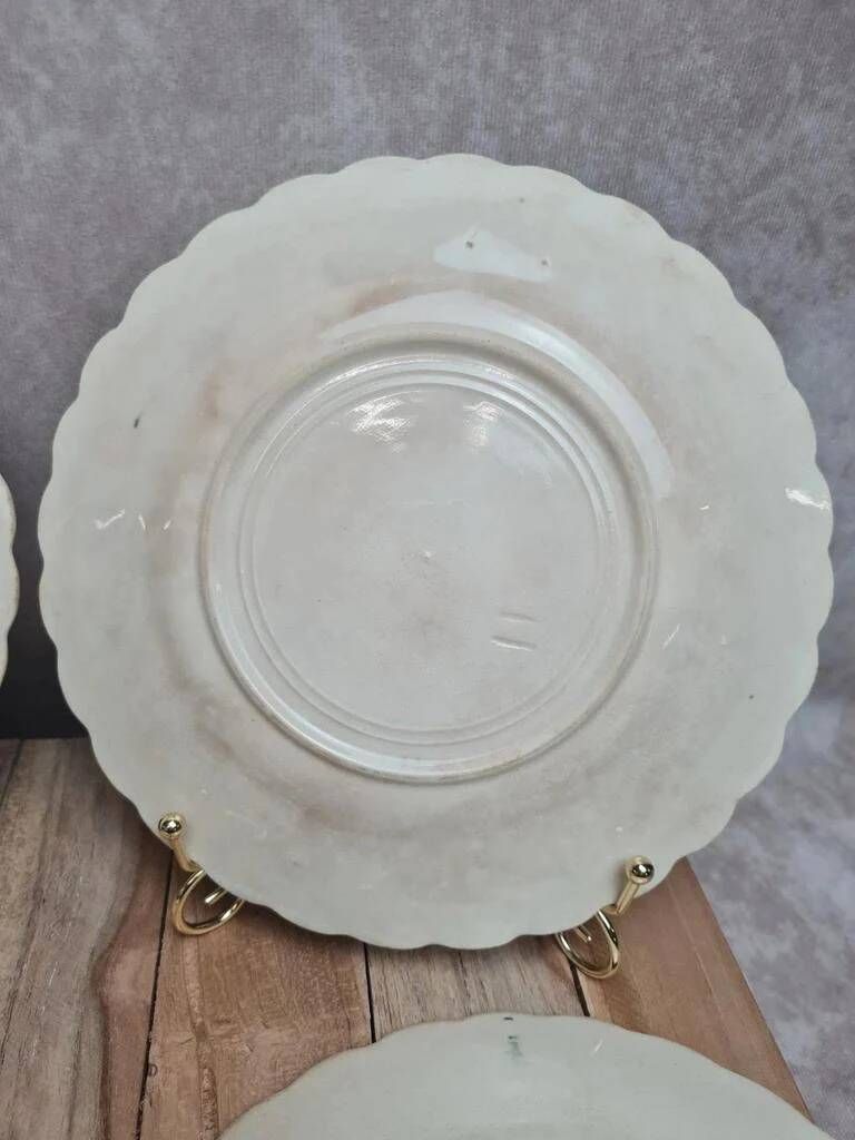 Set of 4 antique dessert plates in ironstone, with blue and green floral decoration.