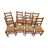 8 wooden chairs, straw seat