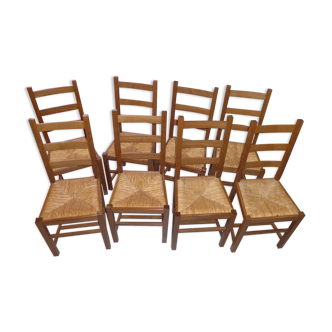 8 wooden chairs, straw seat