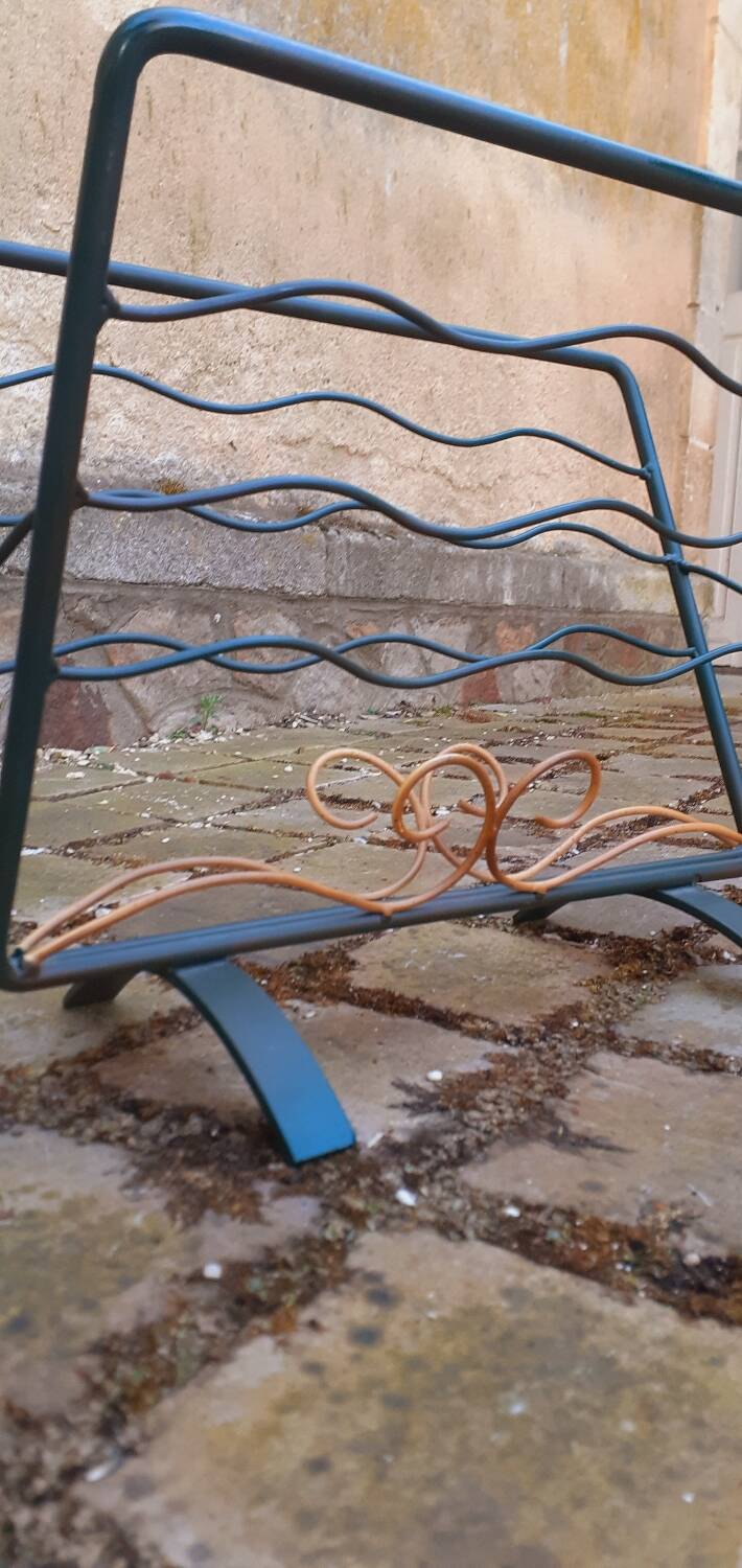 Wrought iron magazine rack from the 1950s