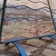 Wrought iron magazine rack from the 1950s