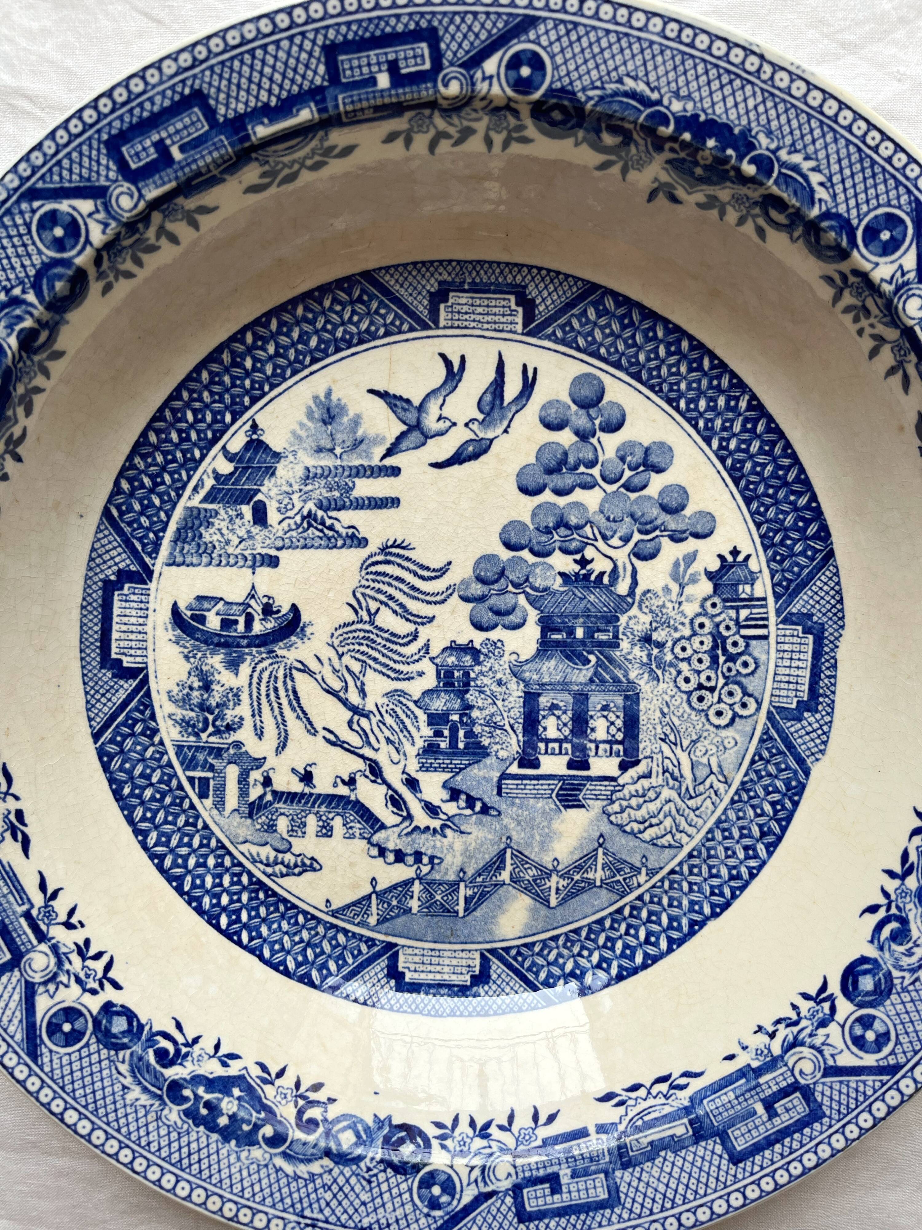 Hollow ironstone dish with blue Japanese decor