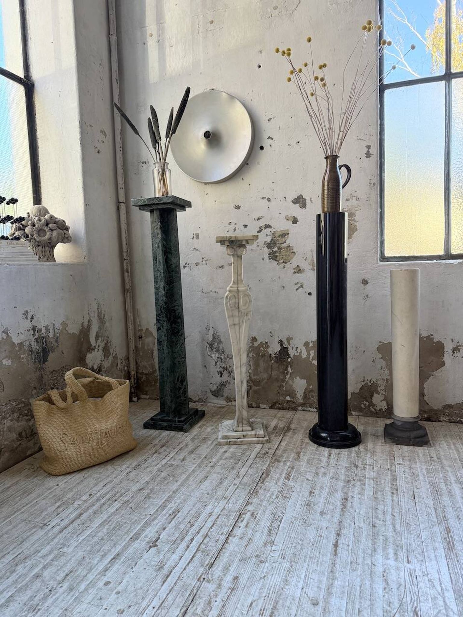 Set of 4 marble columns or pedestals.