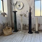 Set of 4 marble columns or pedestals.