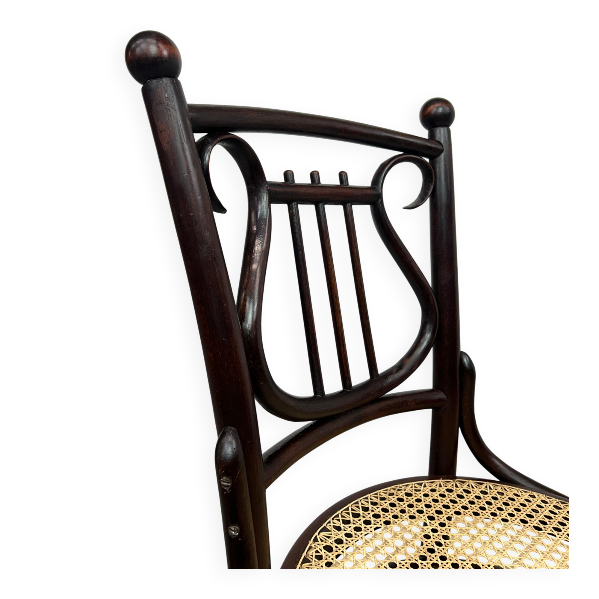 Curved wooden chair attributed to Thonet.