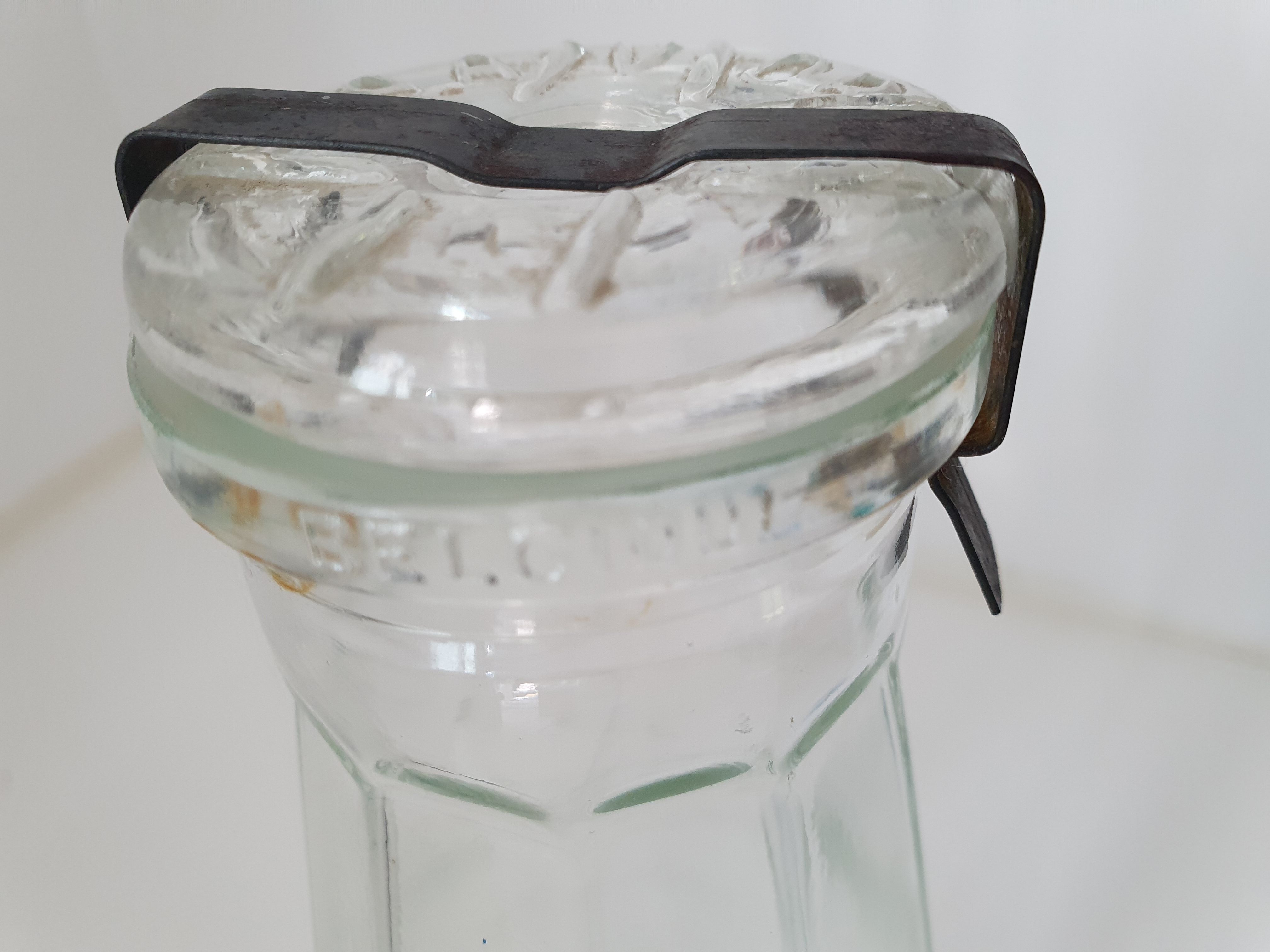 Glass jar with fastener