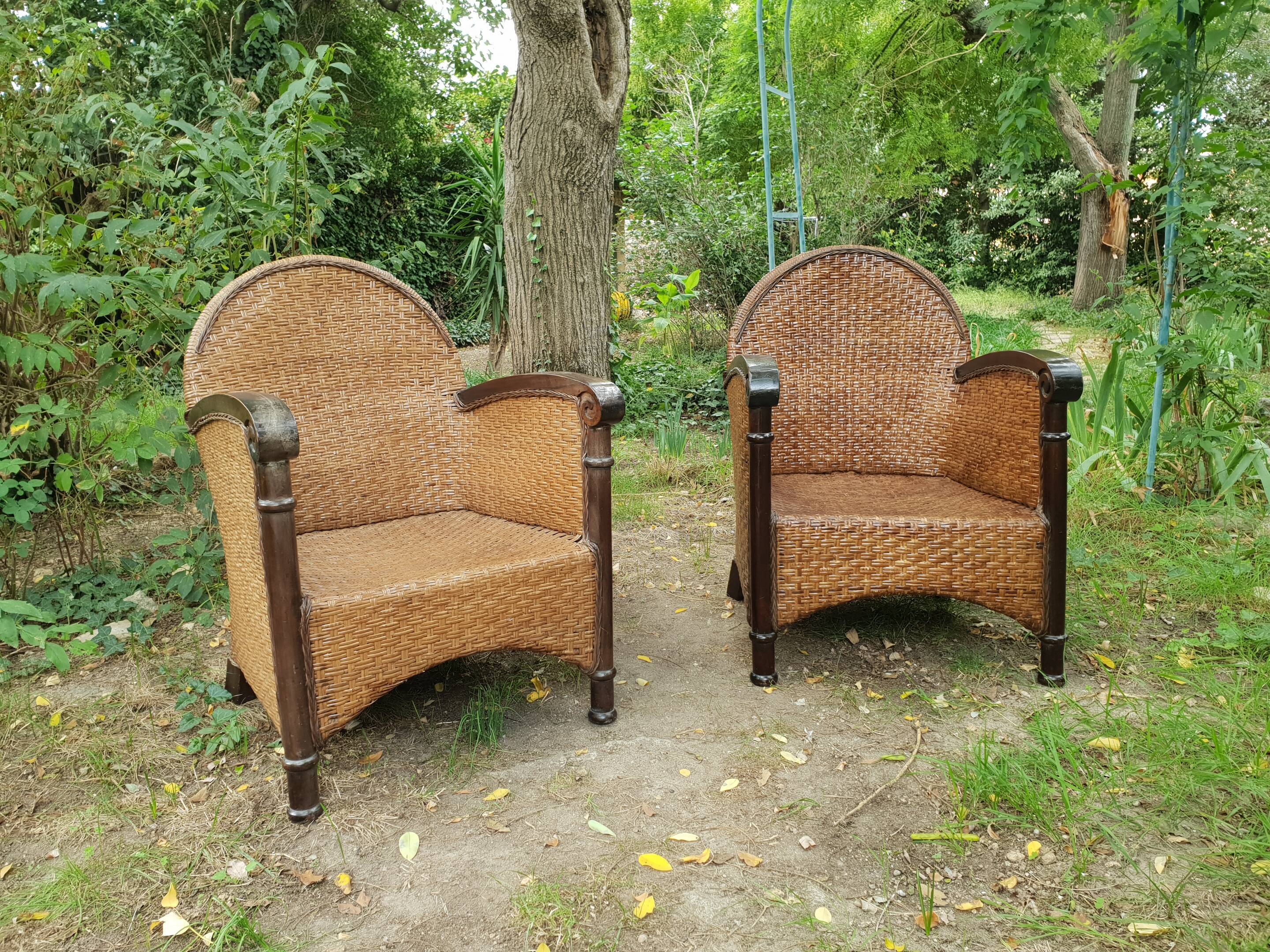 Paire de fauteuils en bois et rotin 1980
