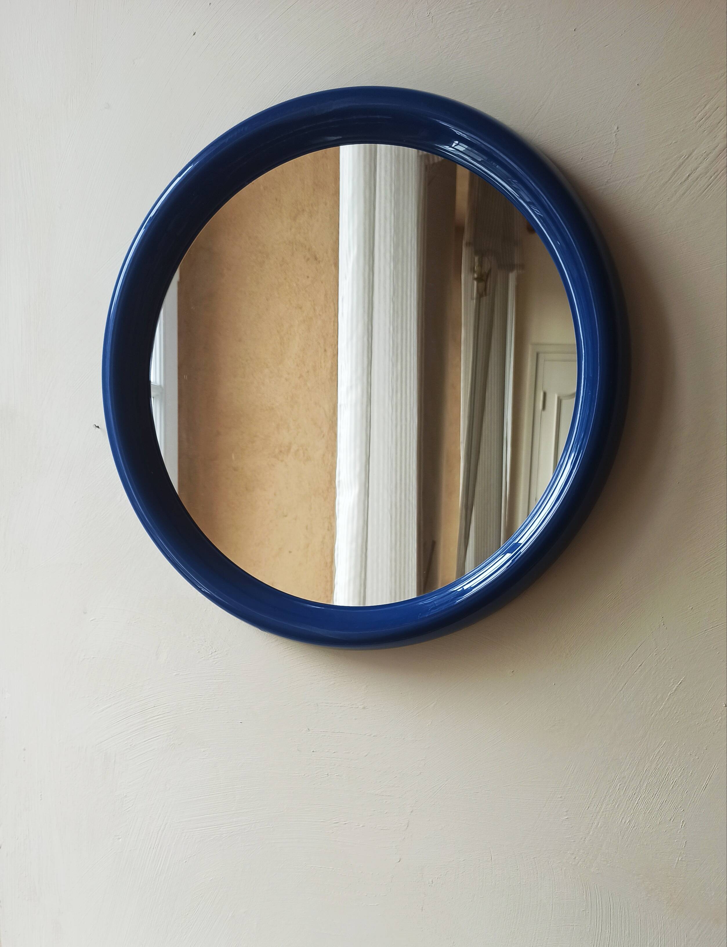 Royal blue round mirror space age