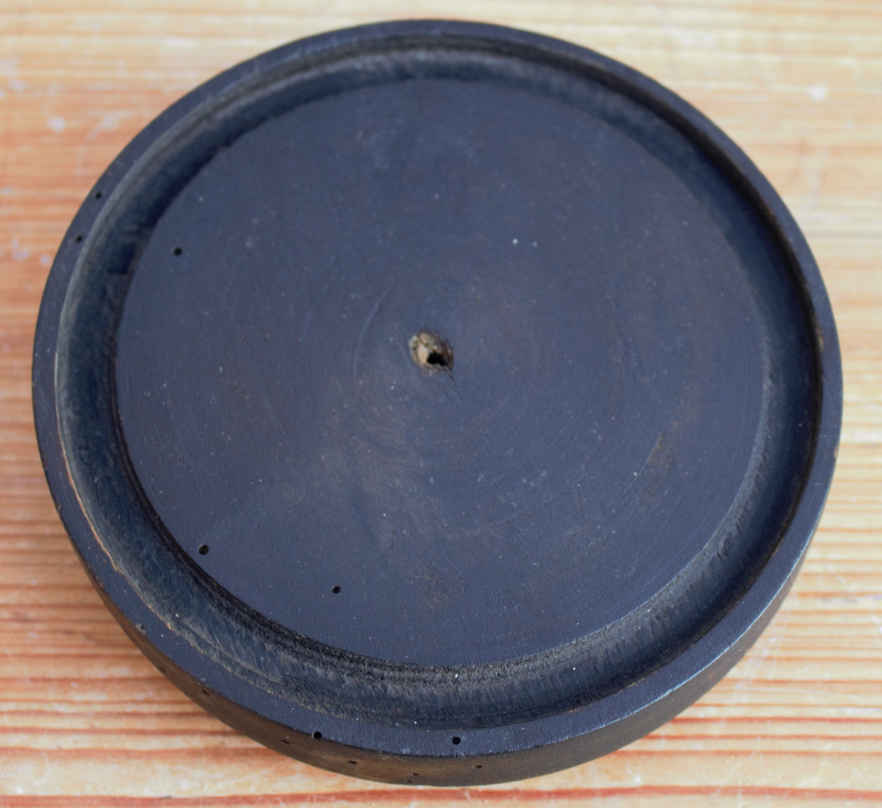 Old glass globe with black foot 17 cm high