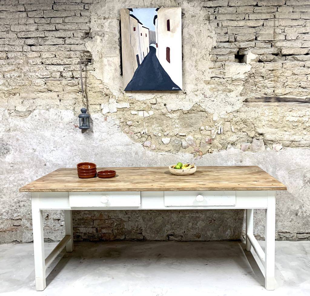 Farm table with off-white legs.