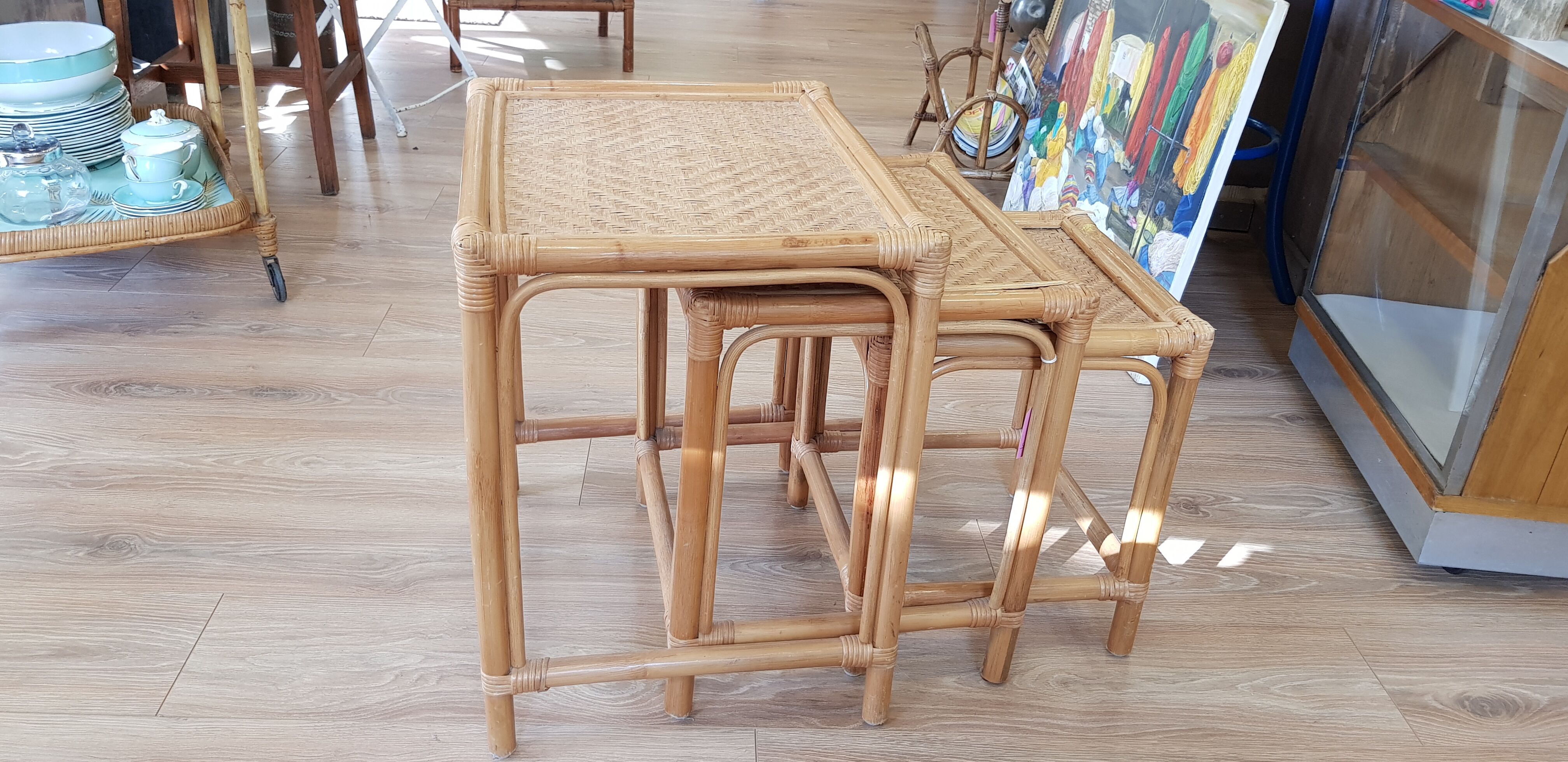 Pull-out tables in rattan
