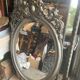 Miroir ovale biseaute  en bois et stuc