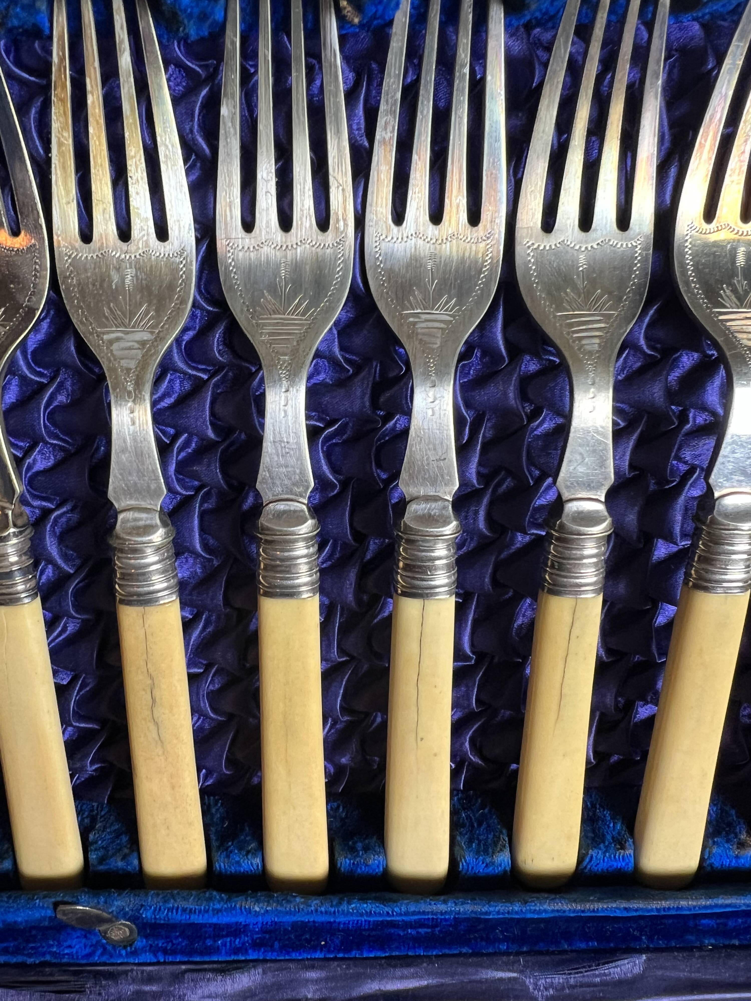 Box of 24 ivory and engraved silver metal cutlery - 19th century