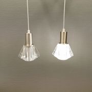 A set of smaller hanging lamps, in hard pressed glass, with metal top