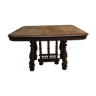 Table with carved wooden foot