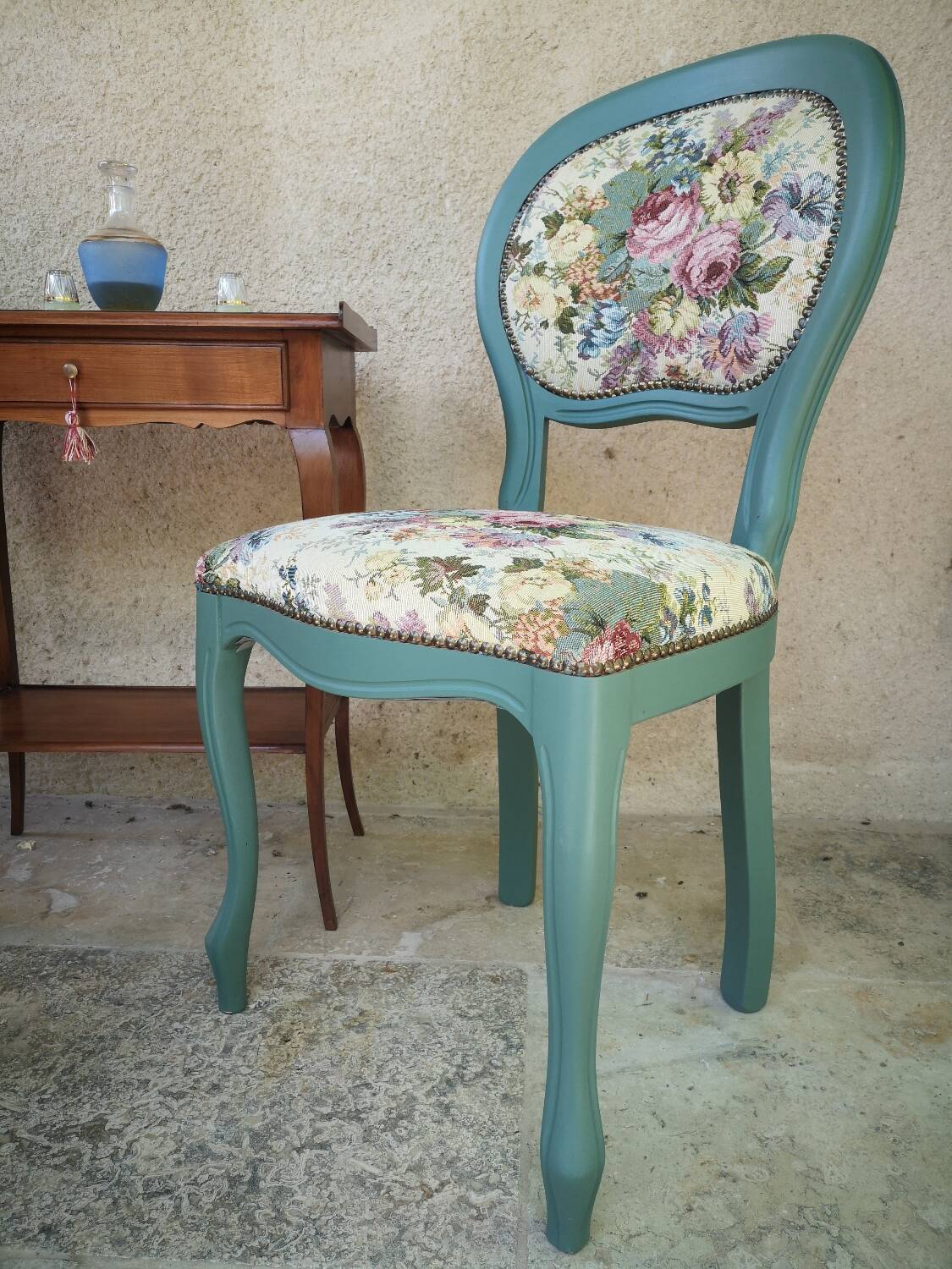 Antique chairs with studded upholstery.