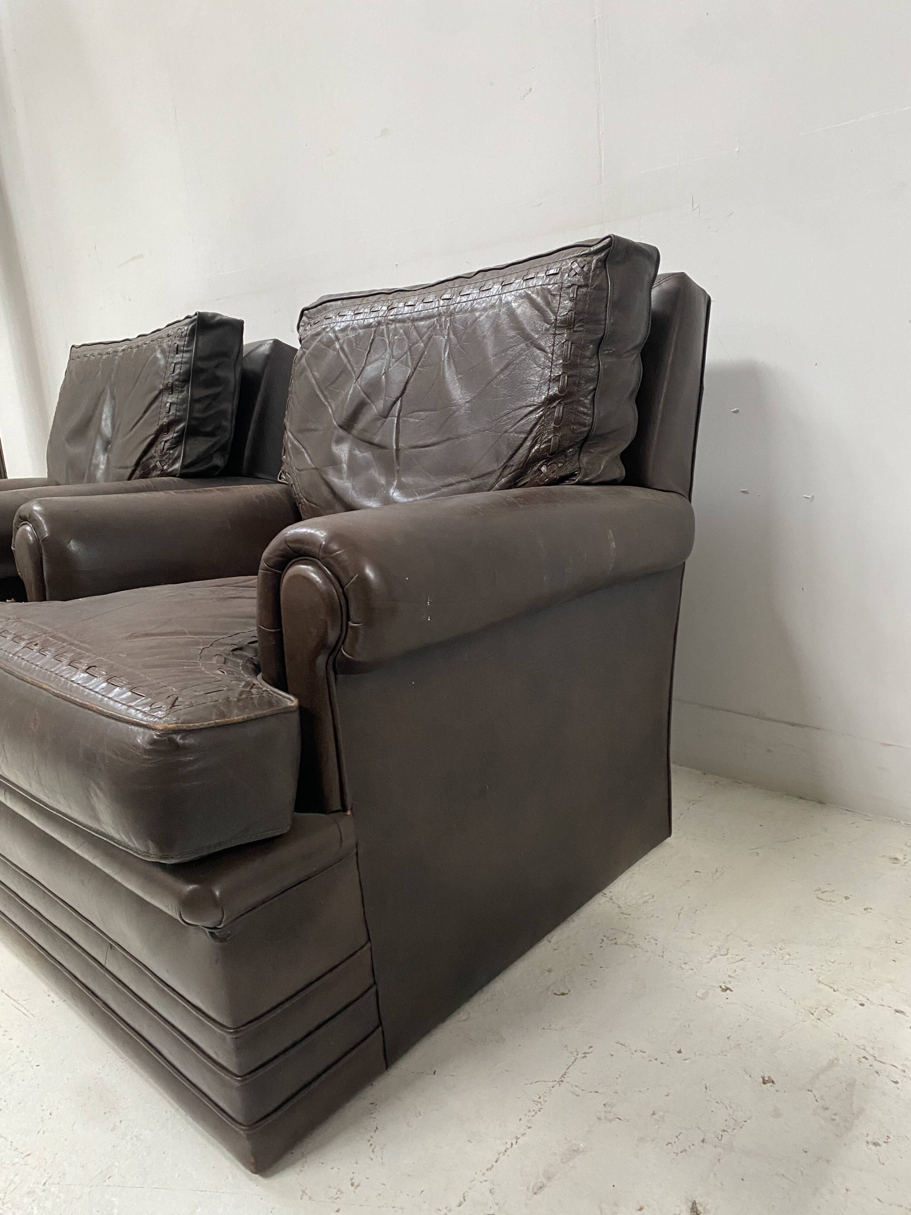 Pair of vintage brown leather armchairs from the 1970s.