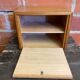 Vintage wooden storage cabinet with shelves