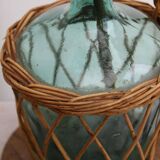 Glass and wicker demijohn