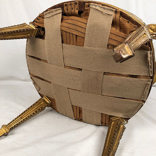 Carved and gilded wooden armchair in Louis XVI style, circa 1900