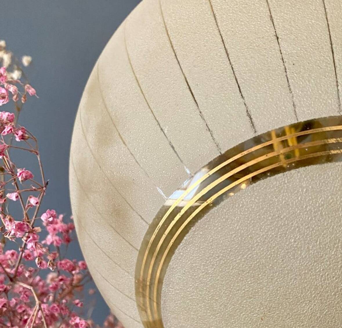 Vintage art deco globe pendant light in yellow and gold granite glass