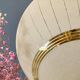 Vintage art deco globe pendant light in yellow and gold granite glass