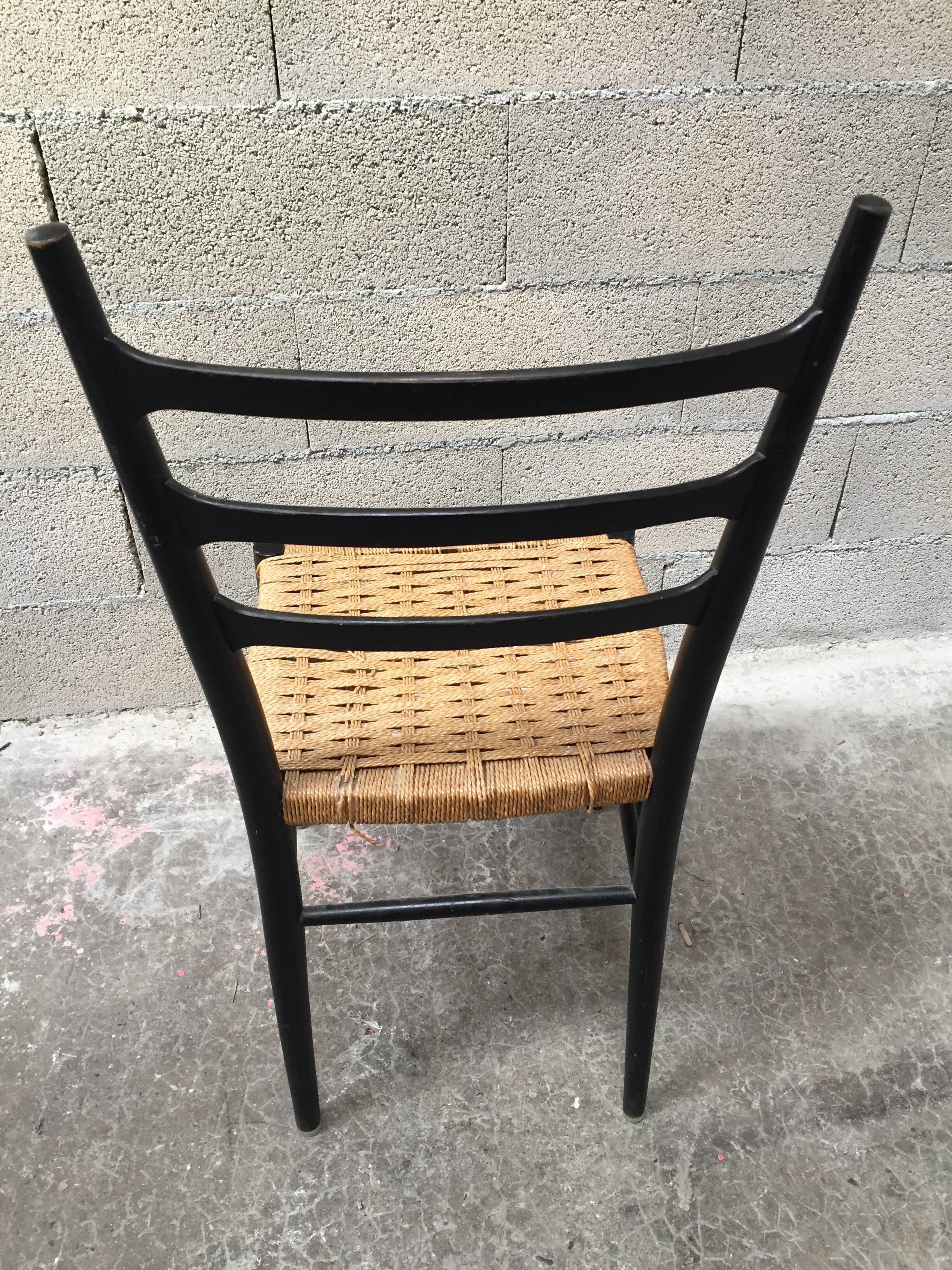 Set of 7 blackened wooden chairs, 1960s vintage