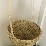 Hanging woven wicker planter
