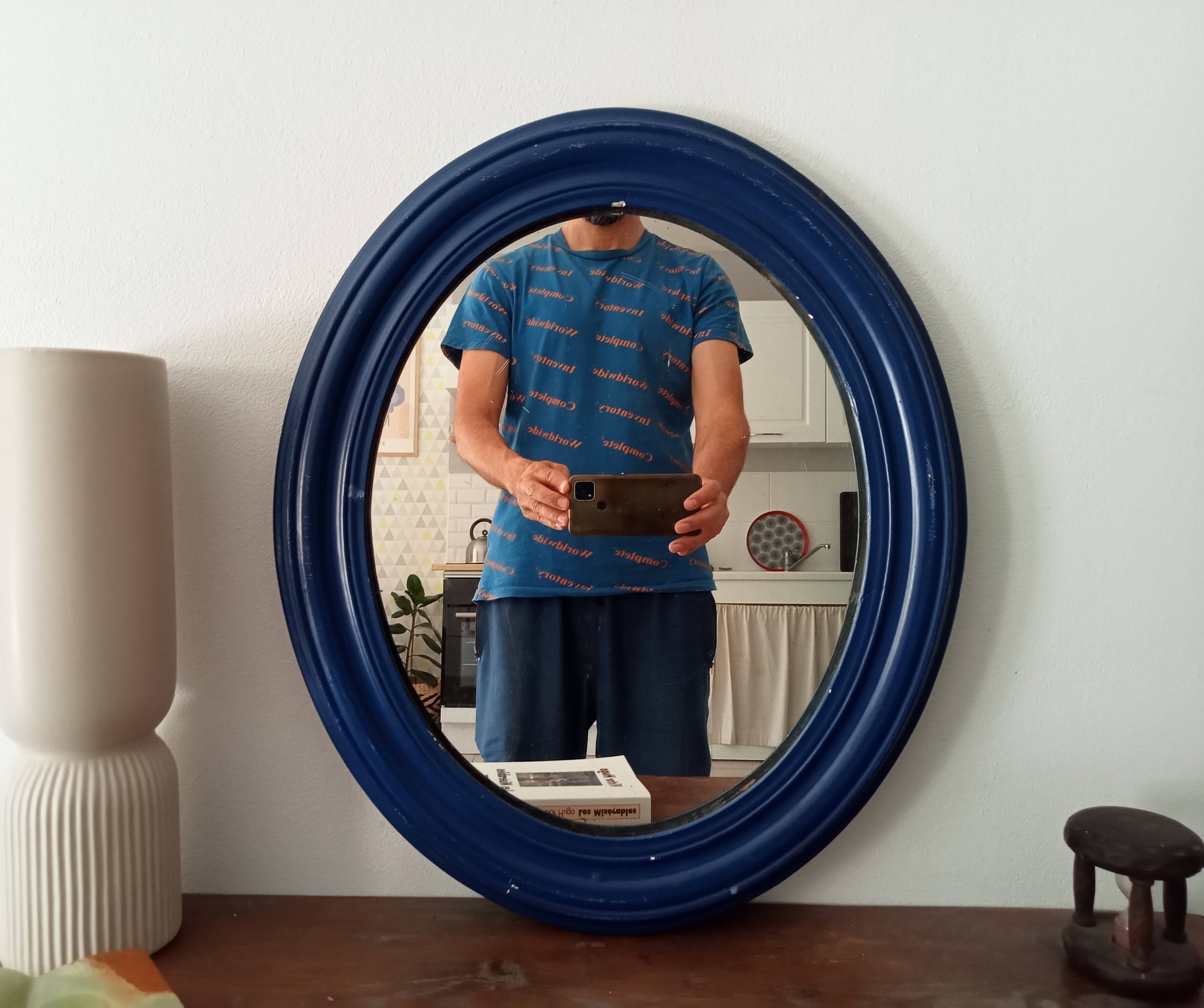 Antique oval mirror in wood and stucco, early 20th century, 51*43 cm