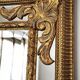 Grand miroir italien doré en bois à verre biseauté