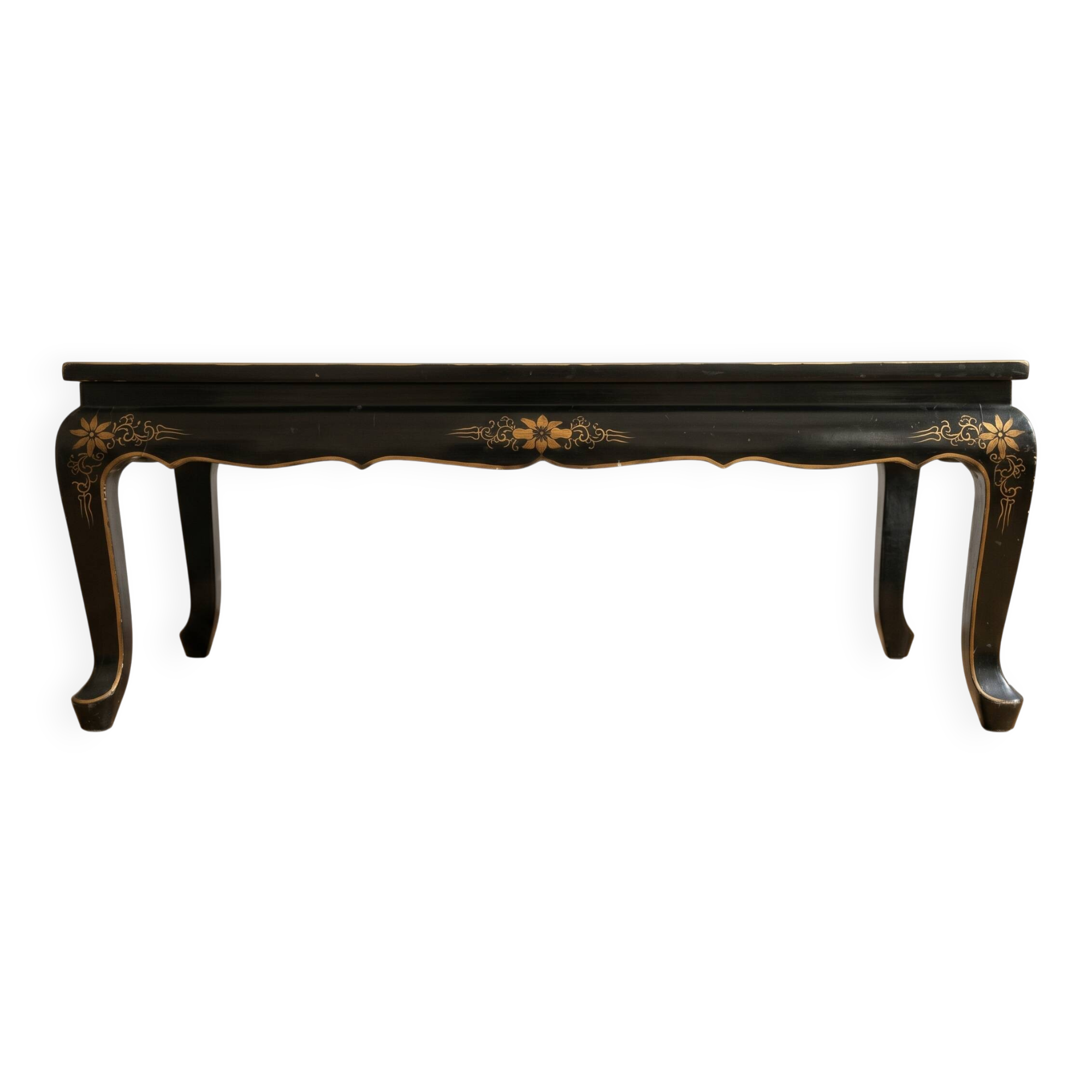 Antique Chinese coffee table in black and gold lacquered wood.