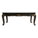Antique Chinese coffee table in black and gold lacquered wood.