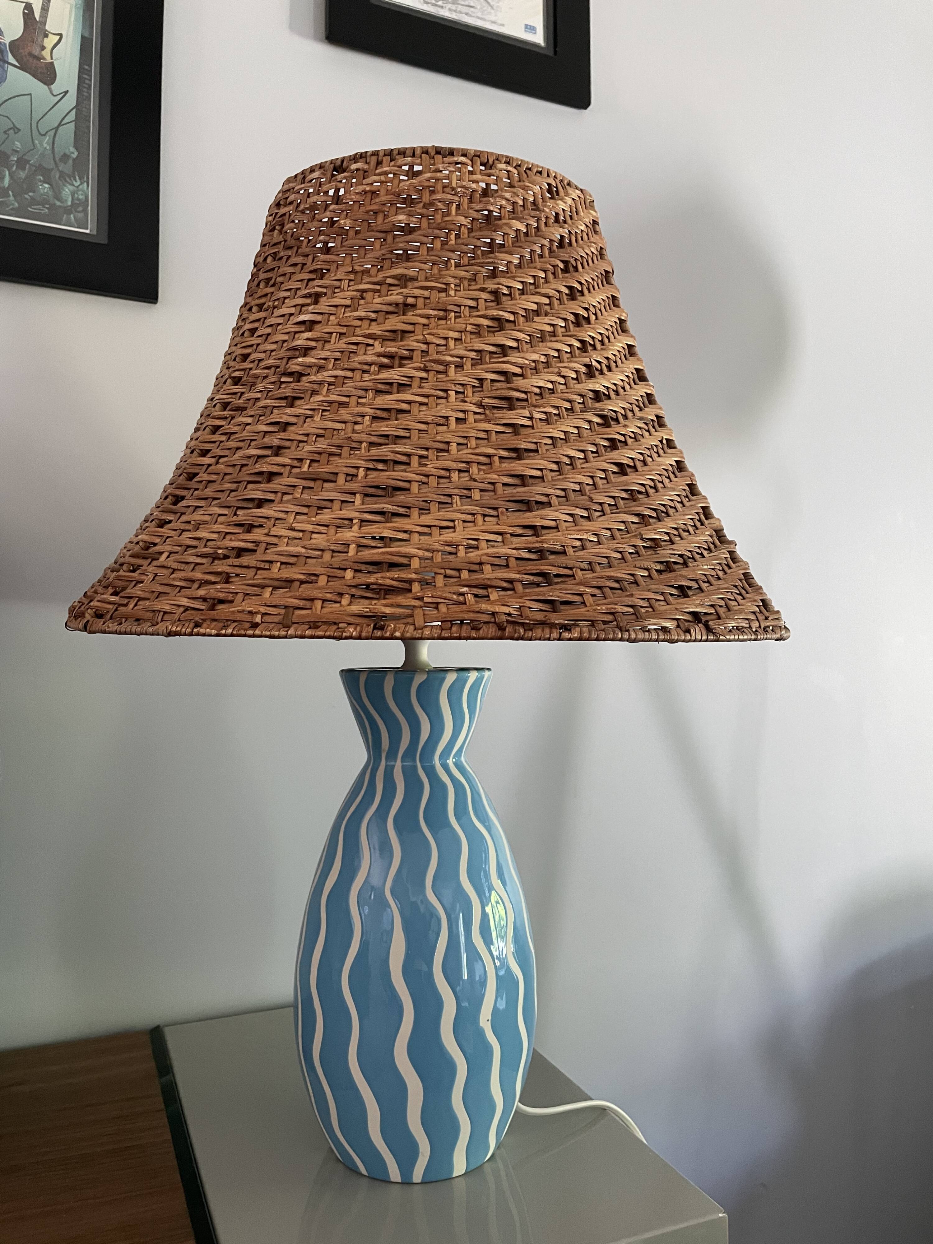 Blue ceramic lamp and rattan